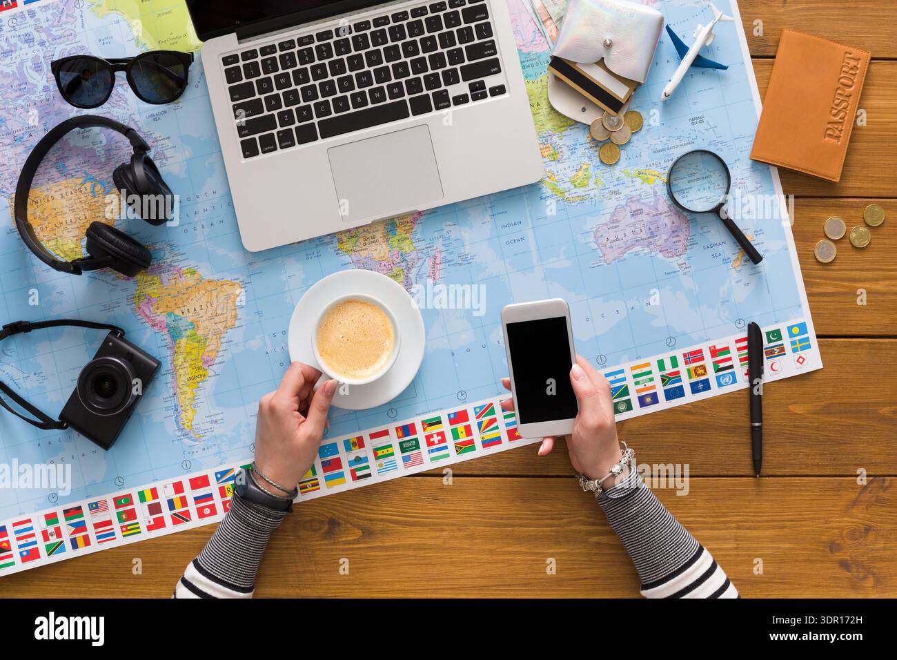 Planning a trip laptop map hi-res stock photography and images - Alamy