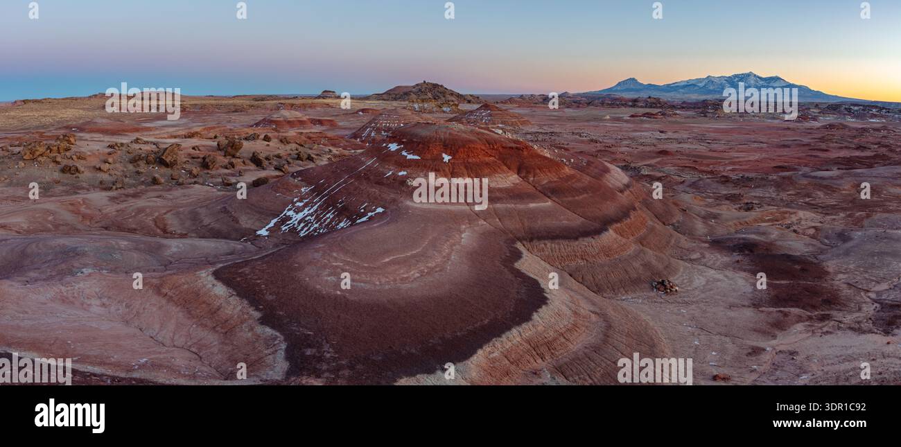 This scenic sunset panorama features the colorful Bentonite Hills