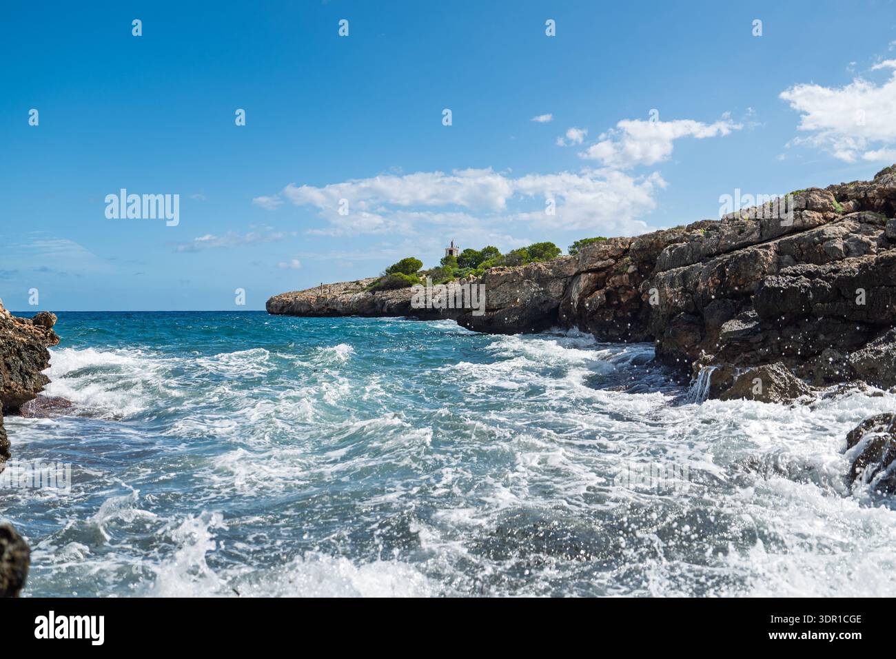 Seascape Majesty Waves Crashing on Rocky Shoreline Under a Brilliant ...