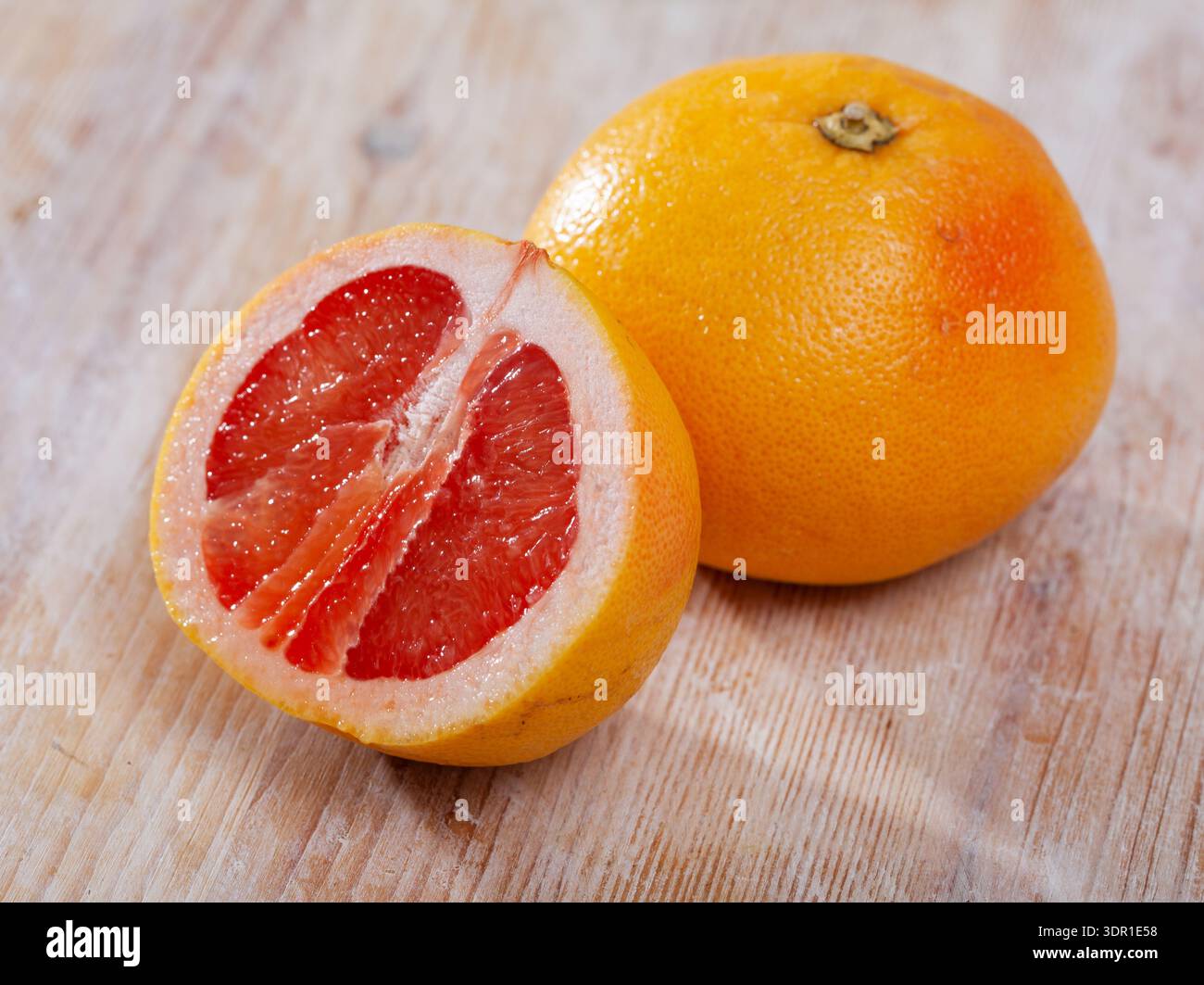 Whole and sliced pomelo Stock Photo