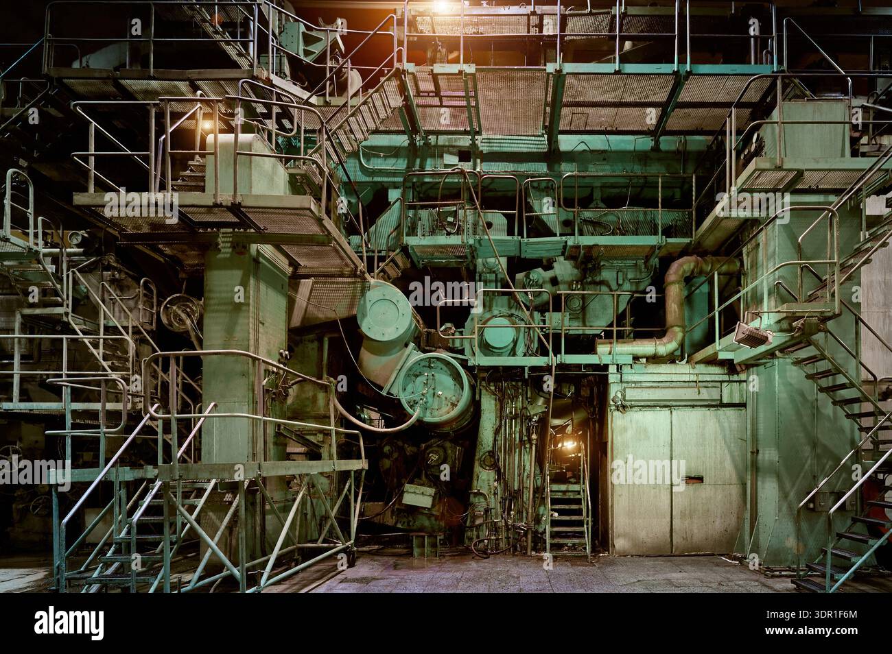 Industrial machinery in a large facility showcasing complex structures ...