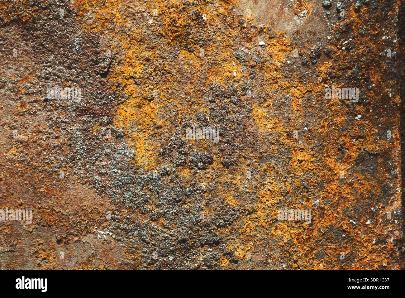 Rusty Surface Shows Textures and Colors on a Metal Structure in an Outdoor Setting Stock Photo