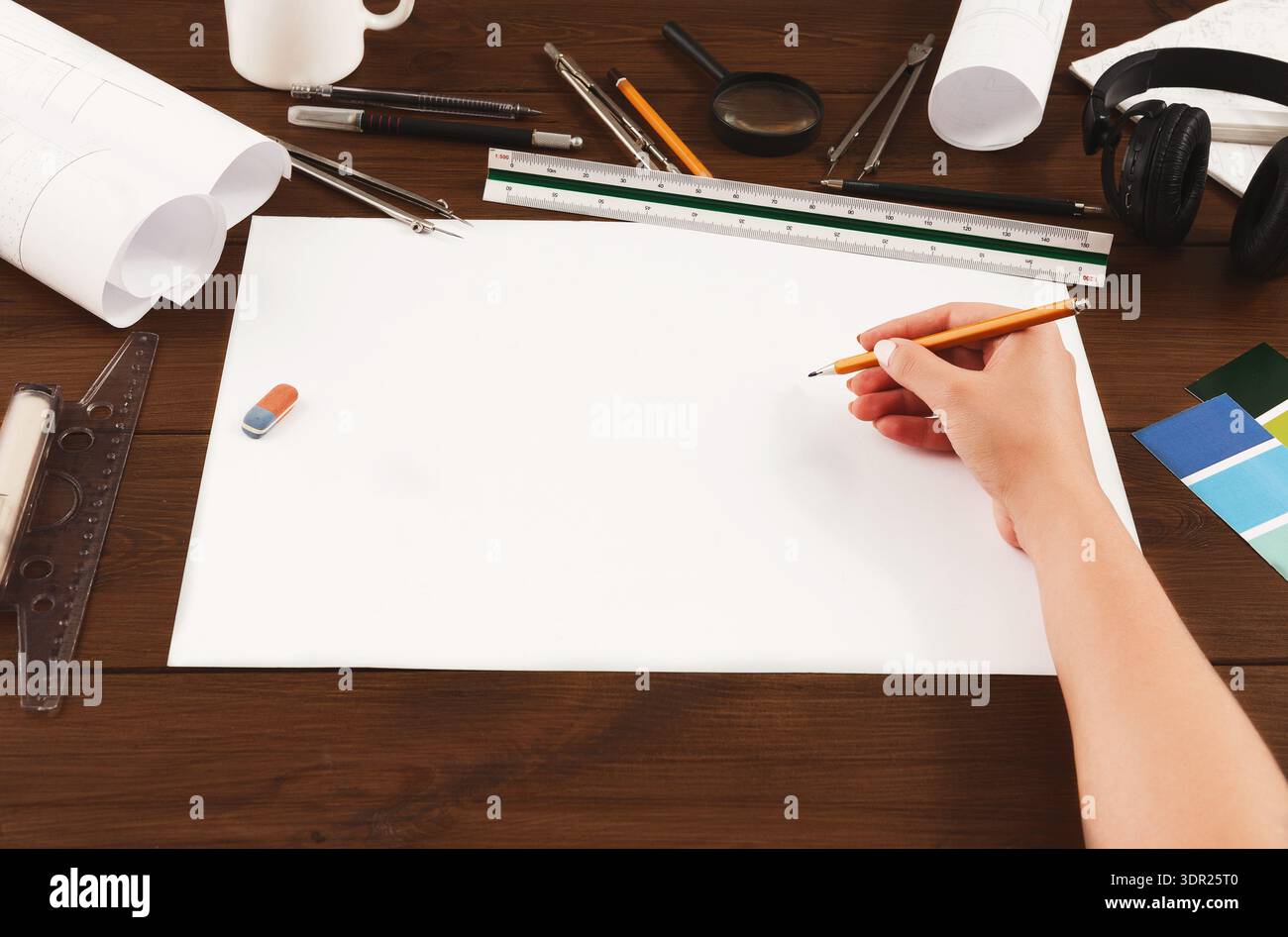 Creative Workspace Set for Design Activities Featuring Various Tools and Materials Stock Photo