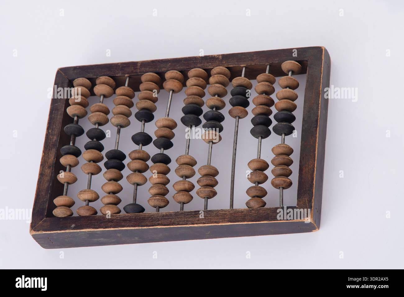 Old Wooden Abacus on White Background. Stock Photo