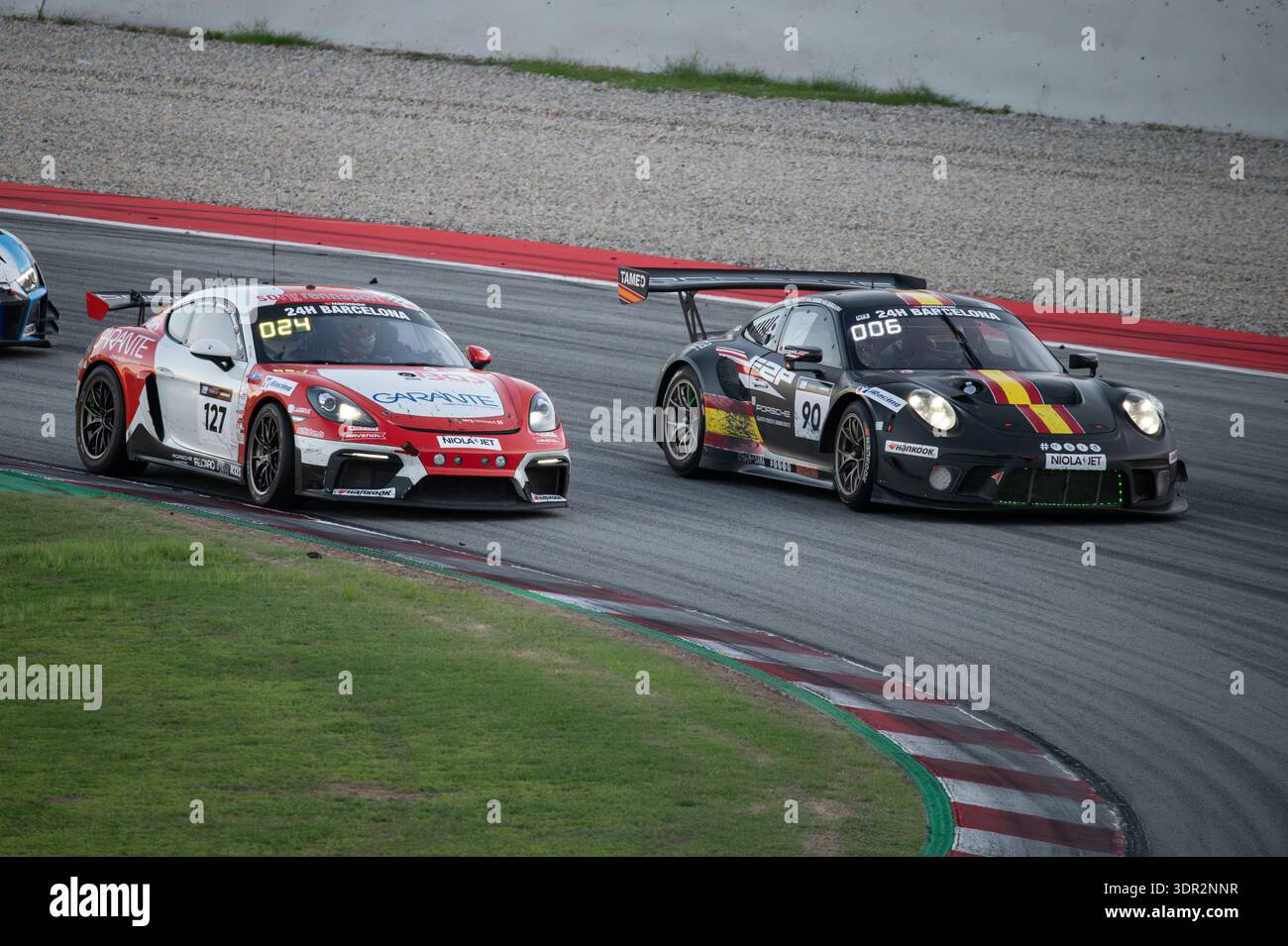 Porsche 911 GT3 R (991 II) of E2P Racing leads a Porsche 718 Cayman GT4 ...