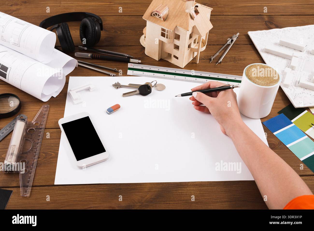Creative Workspace With Tools and a Model House for Design Projects and ...