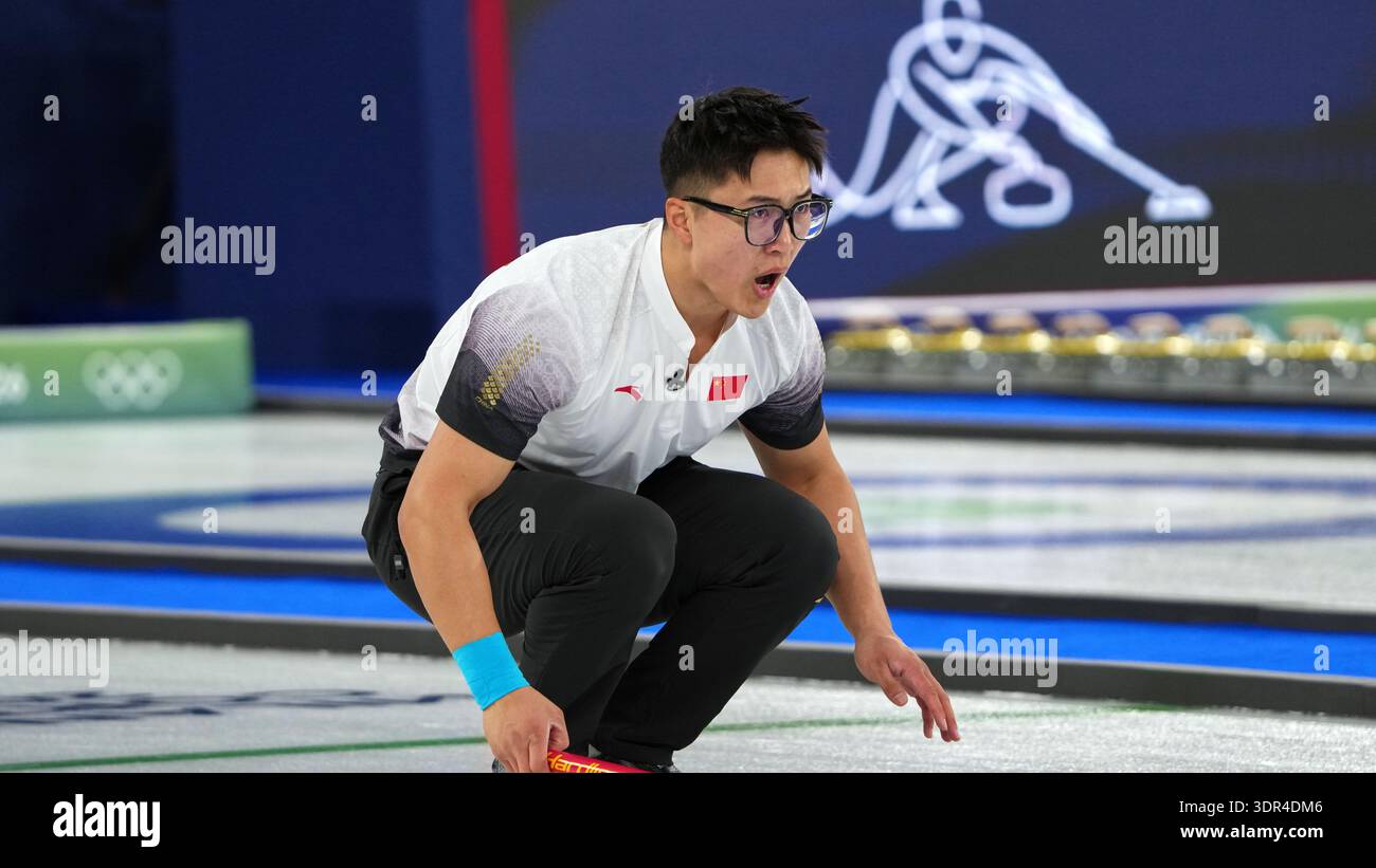 China's Li Zhichao reacts during the men's curling round robin session ...