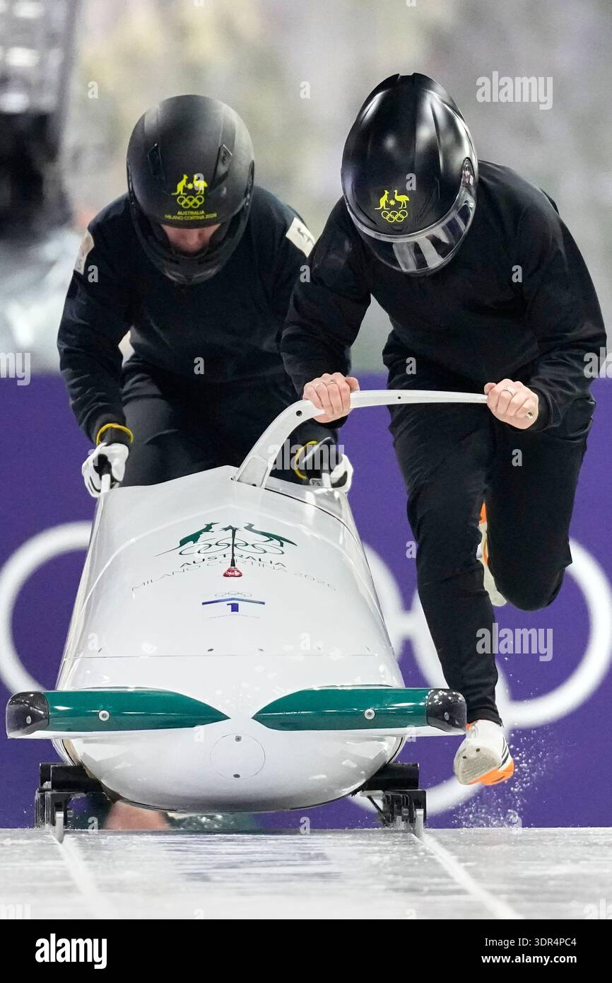 Australia's Bree Walker, right, starts for a two women bobsled training ...