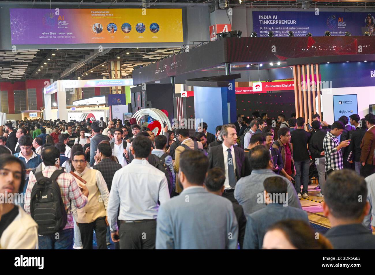 NEW DELHI, INDIA - FEBRUARY 17: Visitors at the India-AI Impact Summit ...