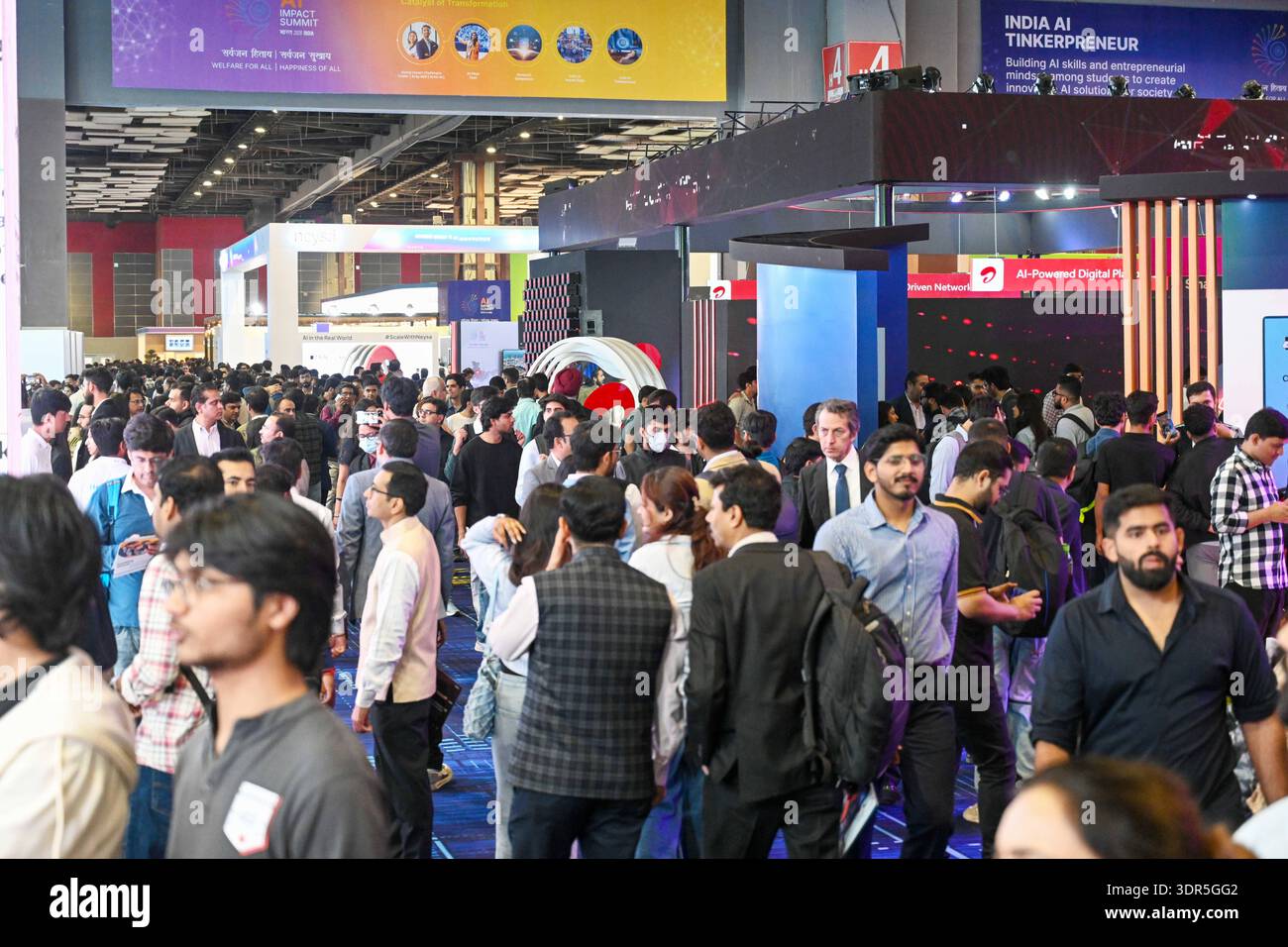 NEW DELHI, INDIA - FEBRUARY 17: Visitors at the India-AI Impact Summit ...