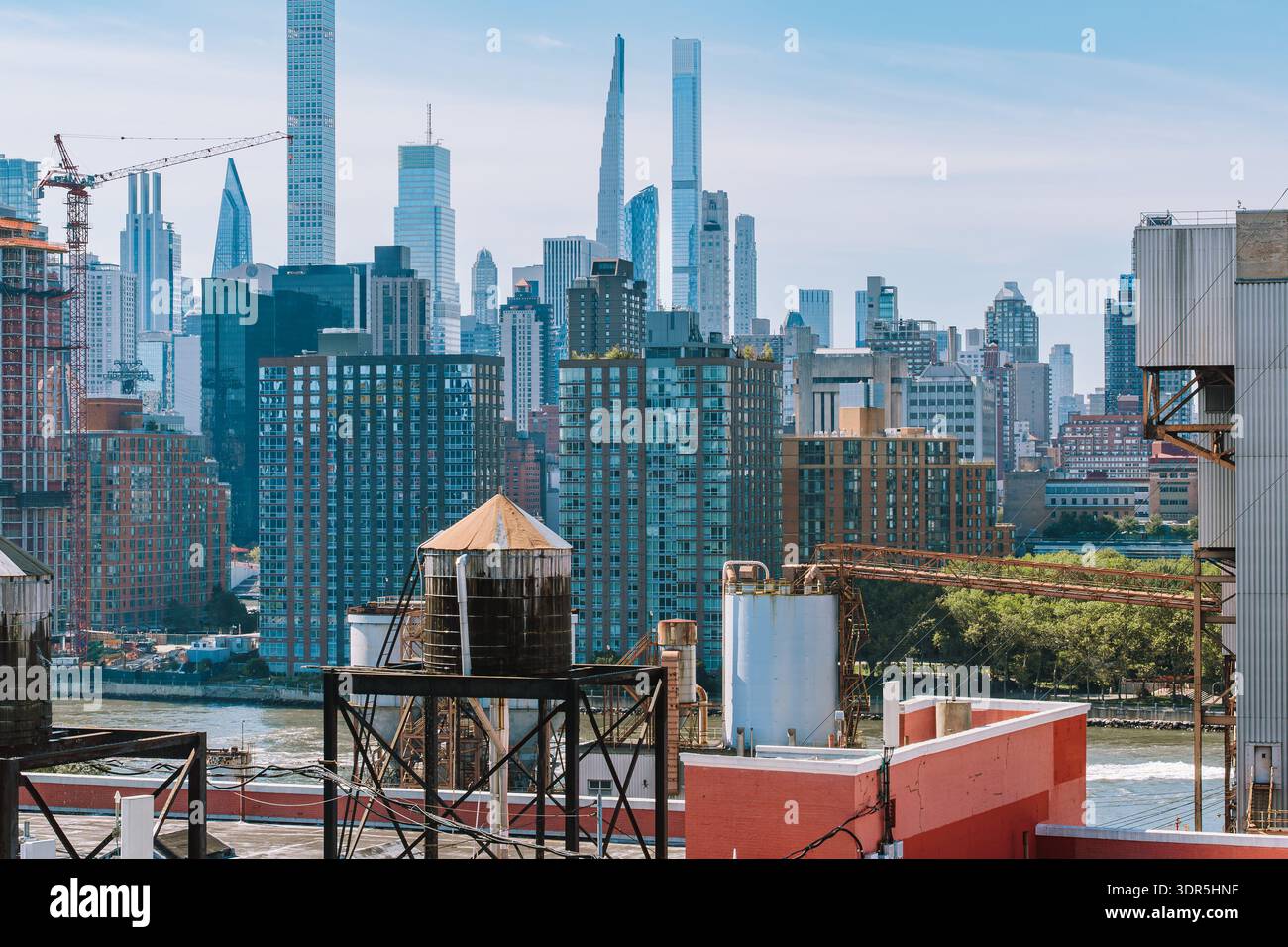 New York skyline showing iconic rooftop water tanks and modern towers ...