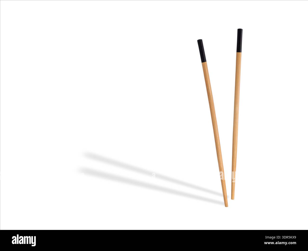 Two Bamboo Chopsticks Isolated on White Background Stock Photo