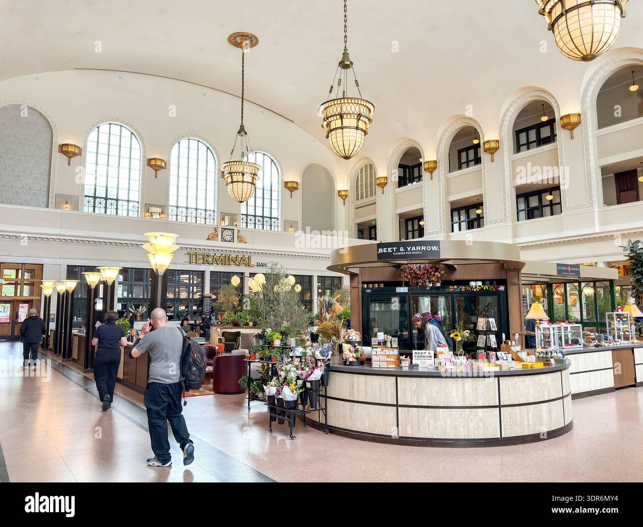 Denver, Colorado, USA - 2 June 2025: Wide angle view of the interior of the renovated hall of the historic Denver Union Station - Smartphone Captured Stock Image
