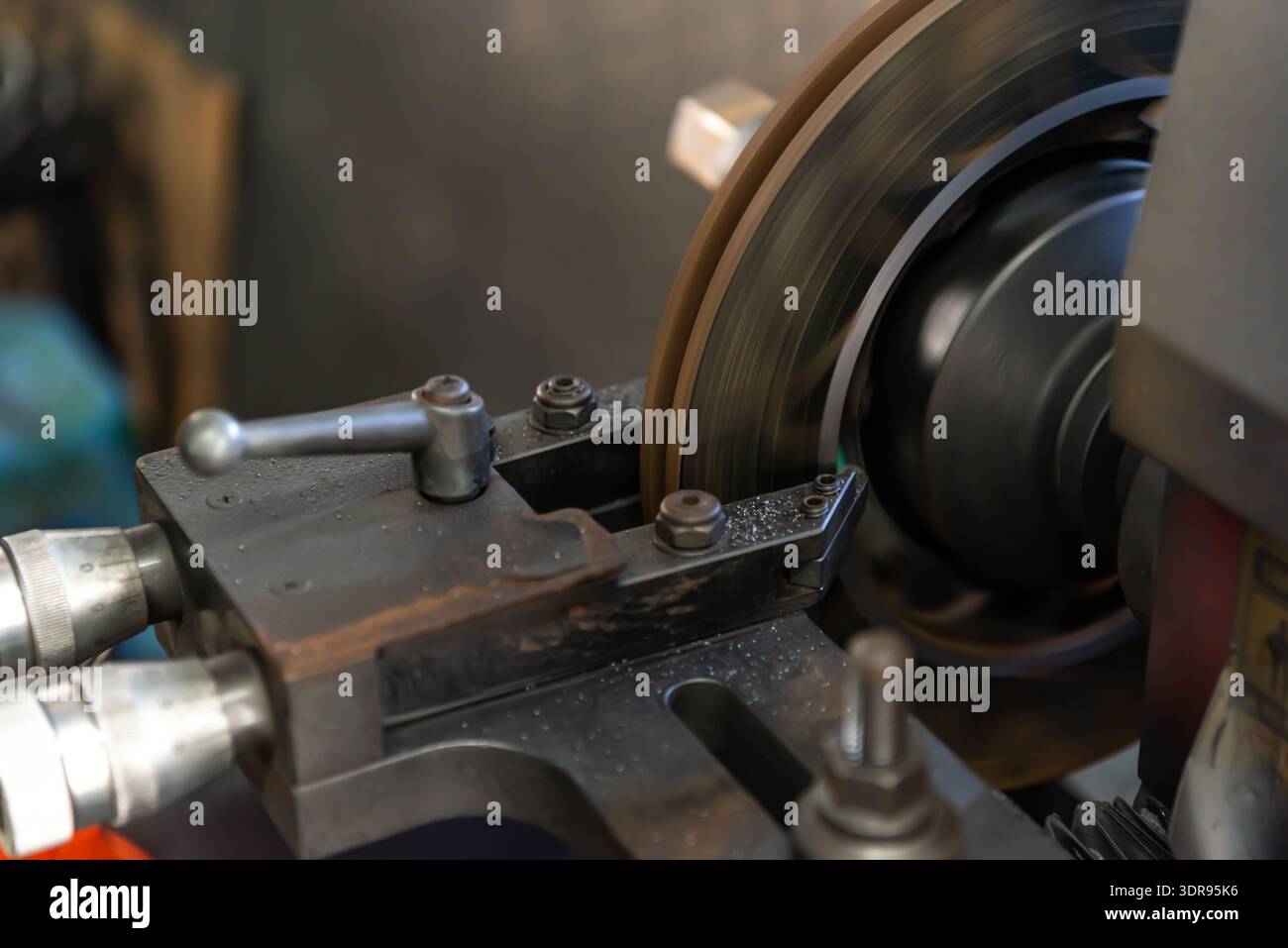 Close up of industrial metal lathe machine cutting steel with rotating ...