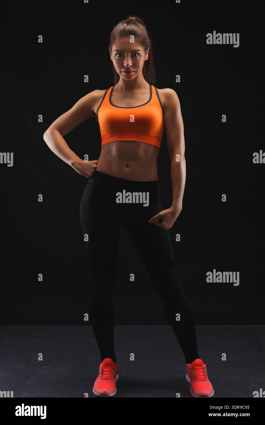 Woman in black top indoors hi-res stock photography and images - Alamy
