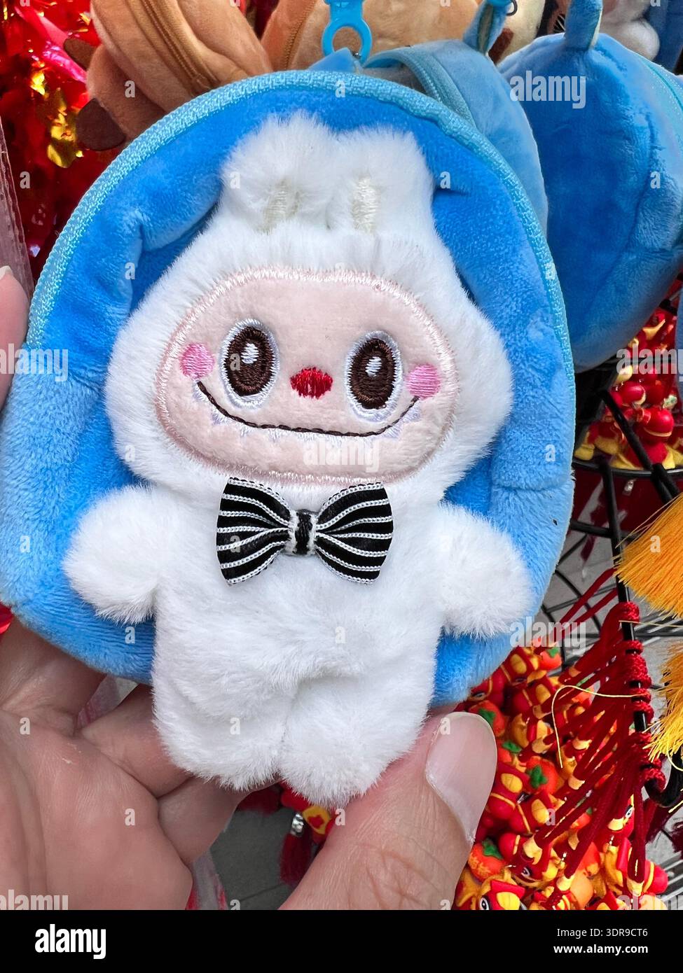 Fake Labubu products for sale selling in open marketplaces. - Smartphone Captured Stock Image