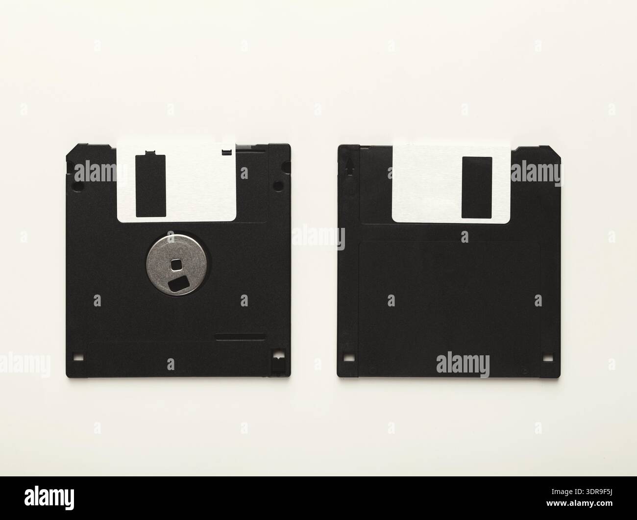 Collection of Black Floppy Disks Arranged in a Collage for Display and Study at a Tech Museum Stock Photo