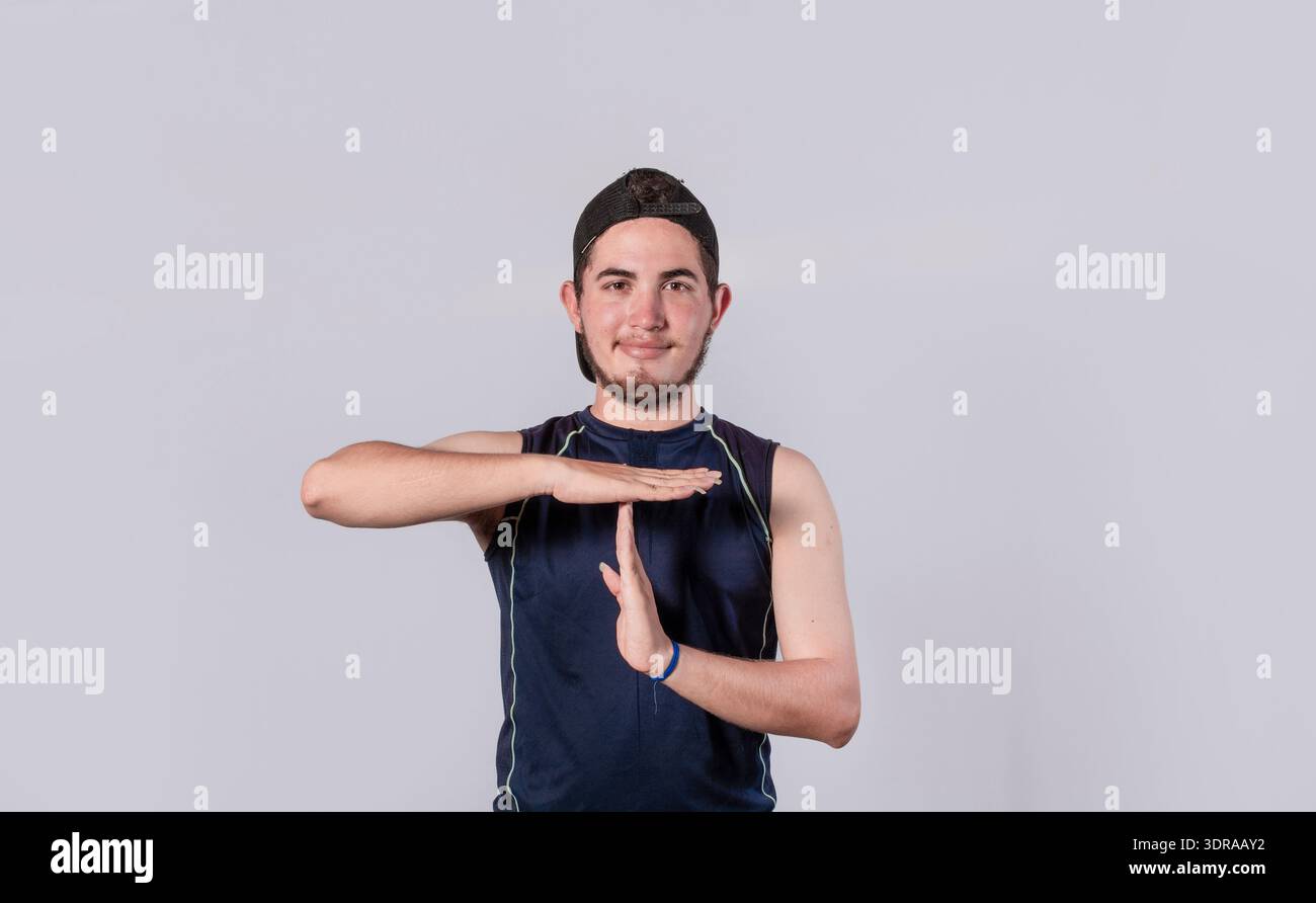 Man making time out gesture, latin guy making time out gesture Stock Photo
