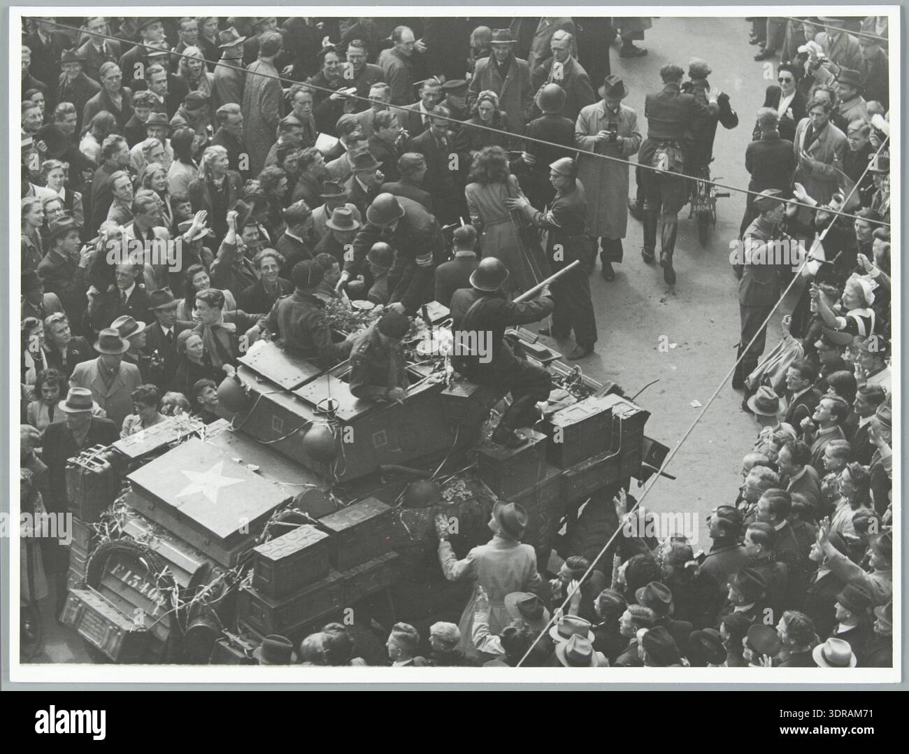 This photograph from 7 May 1945 shows the first Canadian tanks arriving ...
