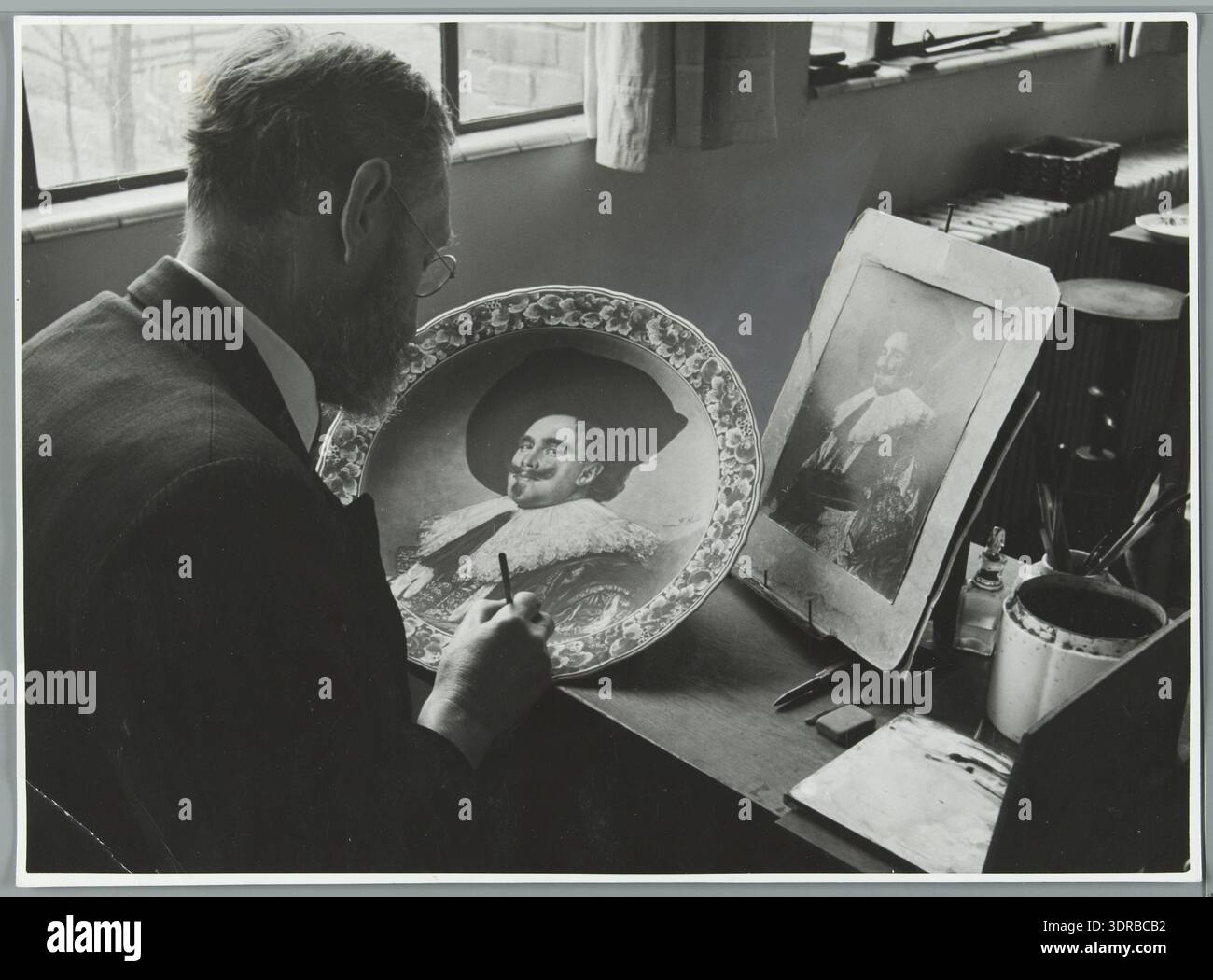 At the De Porceleyne Fles pottery factory in Delft in 1940, a painter ...