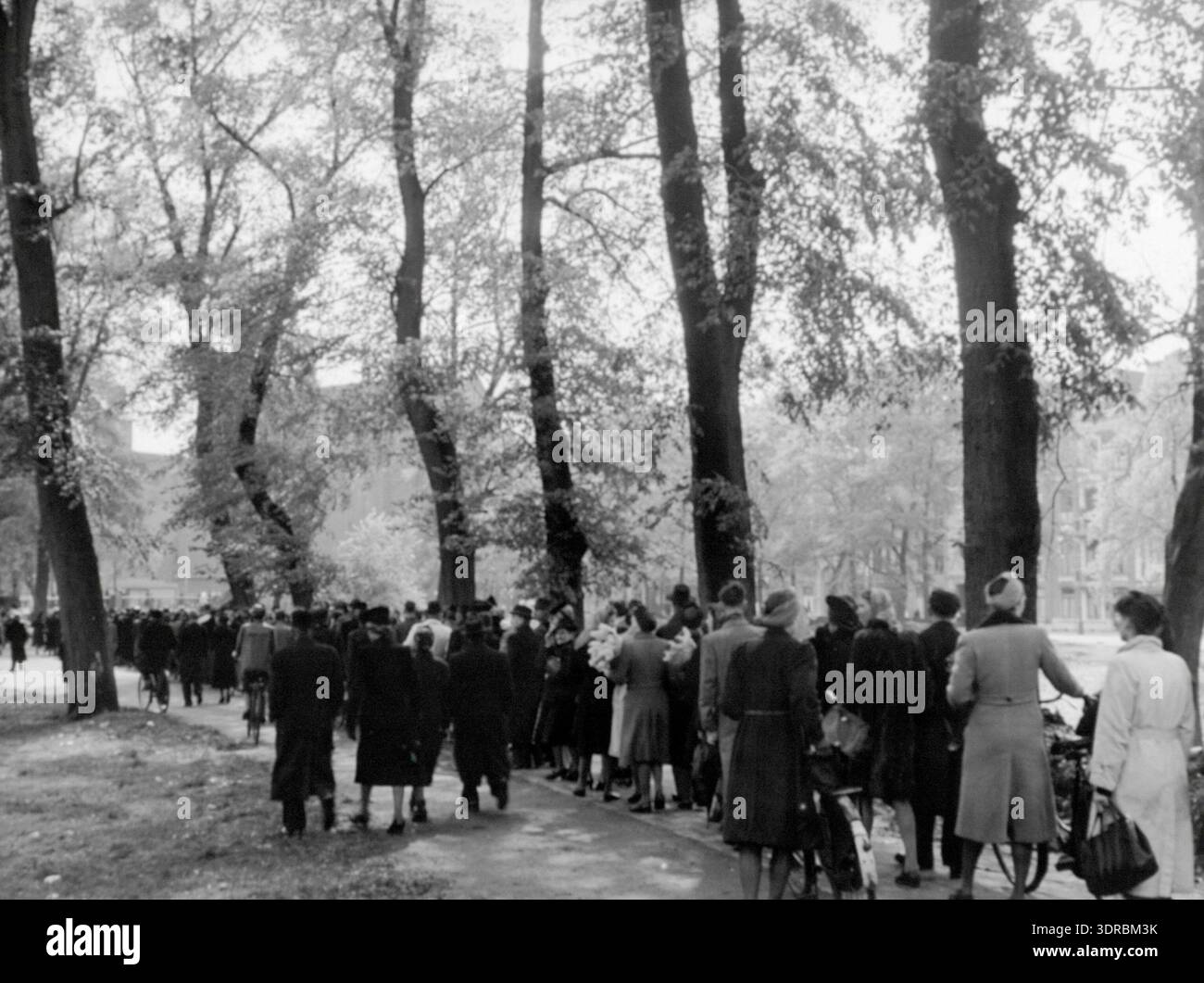 This photograph shows a civilian procession on 6 May 1945 to the ...