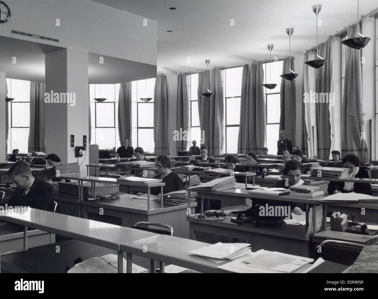 On 11 December 1939, in Amsterdam, Netherlands, civil servants worked ...