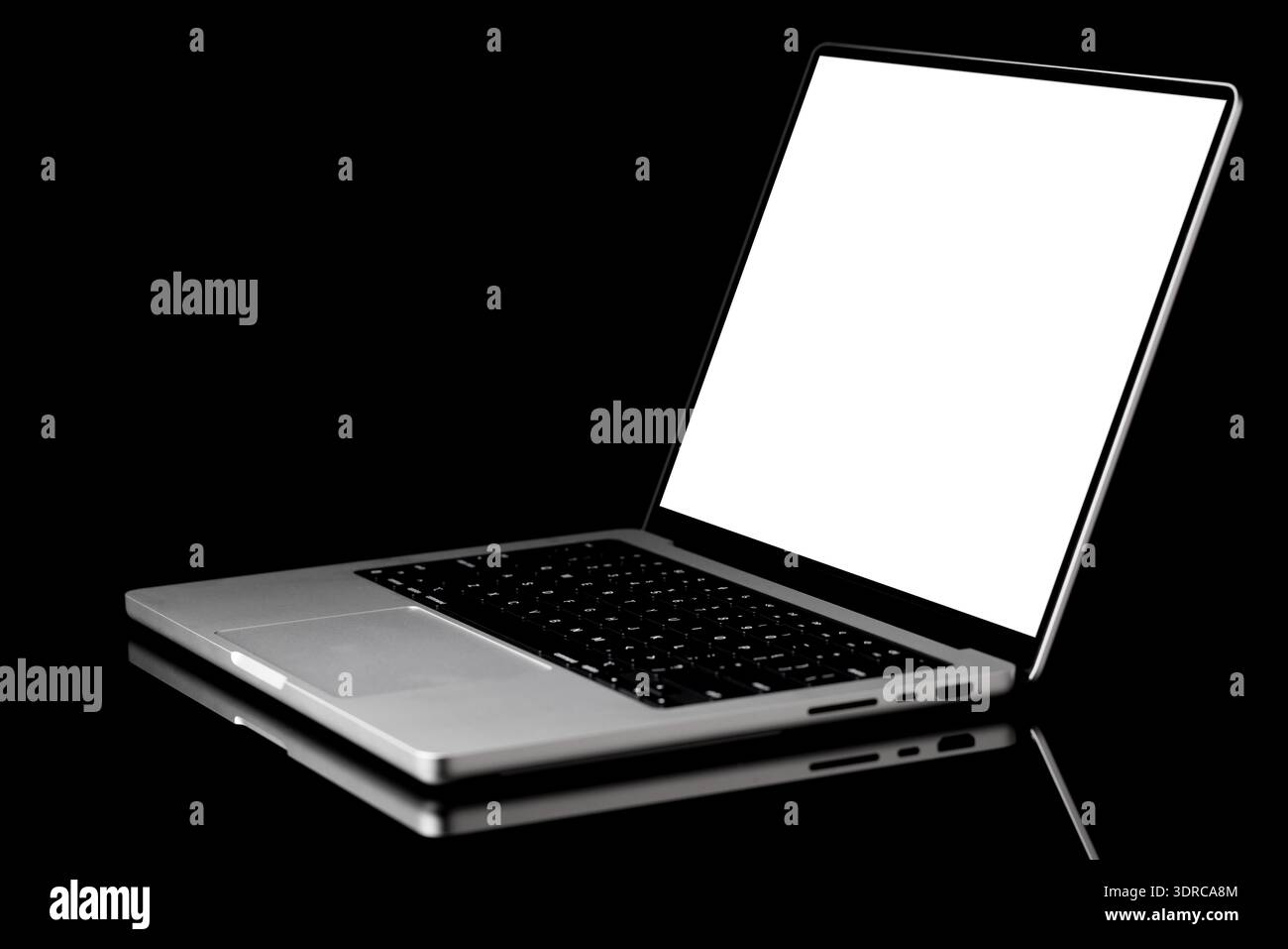 Laptop with a blank screen isolated on a black background Stock Photo