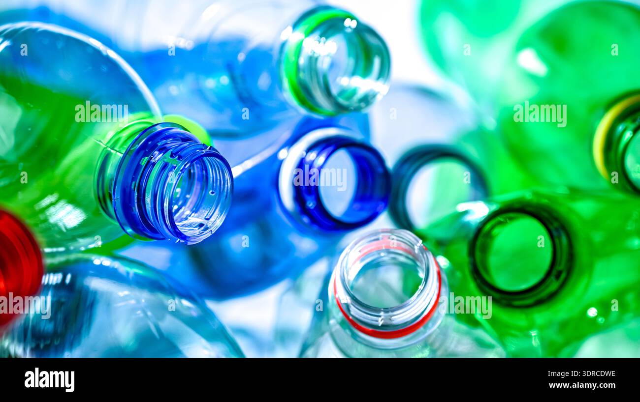 Empty colored drink bottles. Recyclable plastic waste. Stock Photo