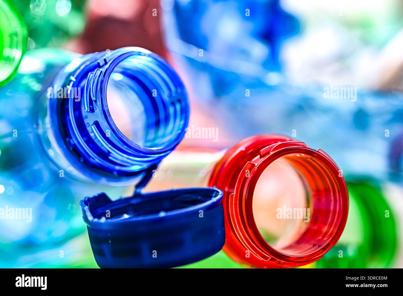 Empty colored drink bottles. Recyclable plastic waste. Stock Photo