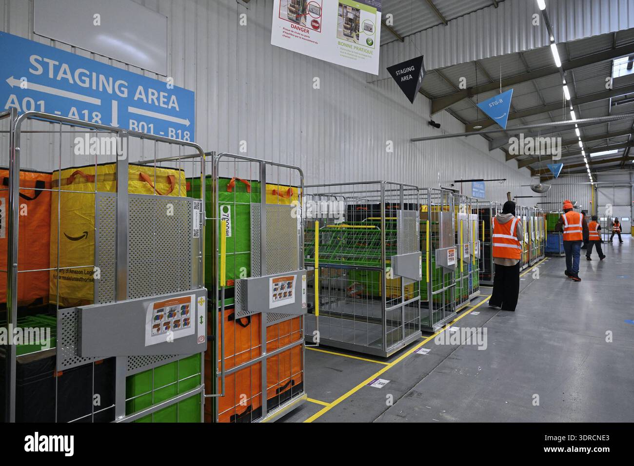 Workers pictured at the Amazon logistics site in Strasbourg, France, on ...