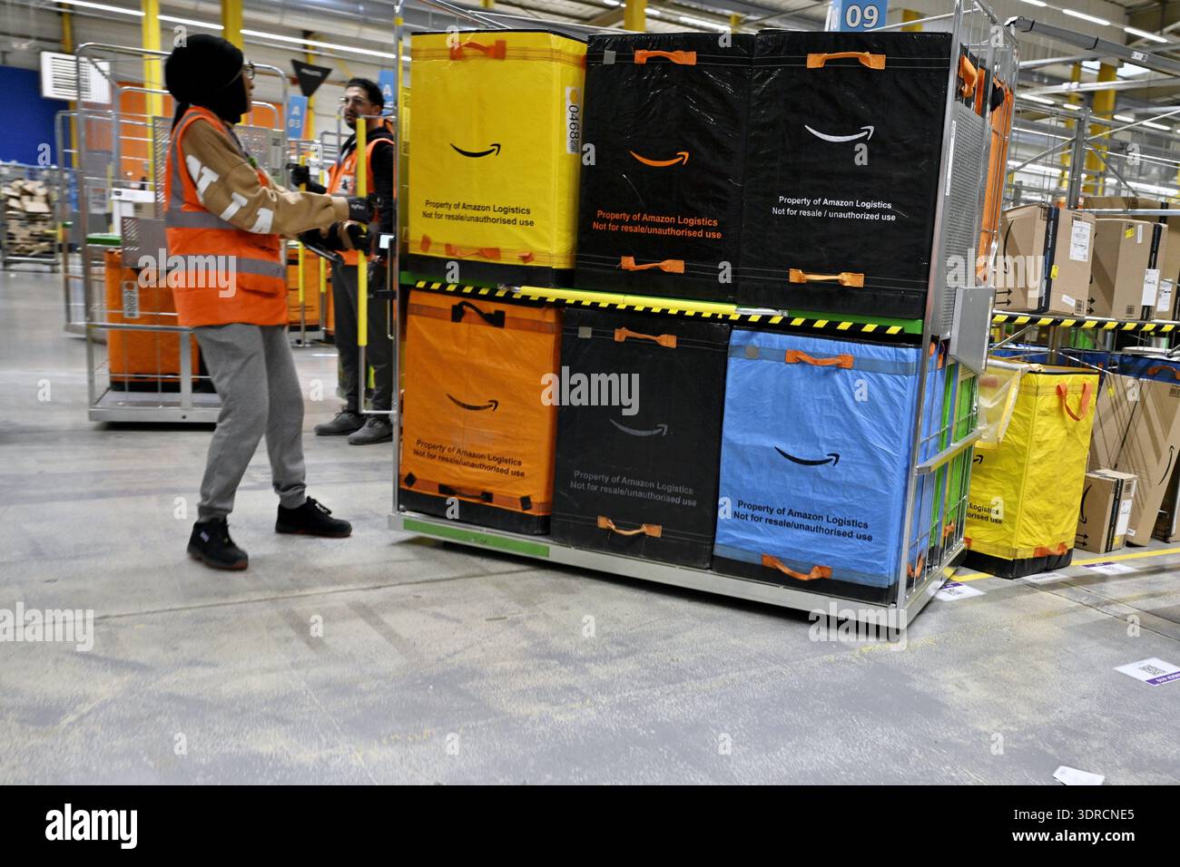 Workers pictured at the Amazon logistics site in Strasbourg, France, on ...