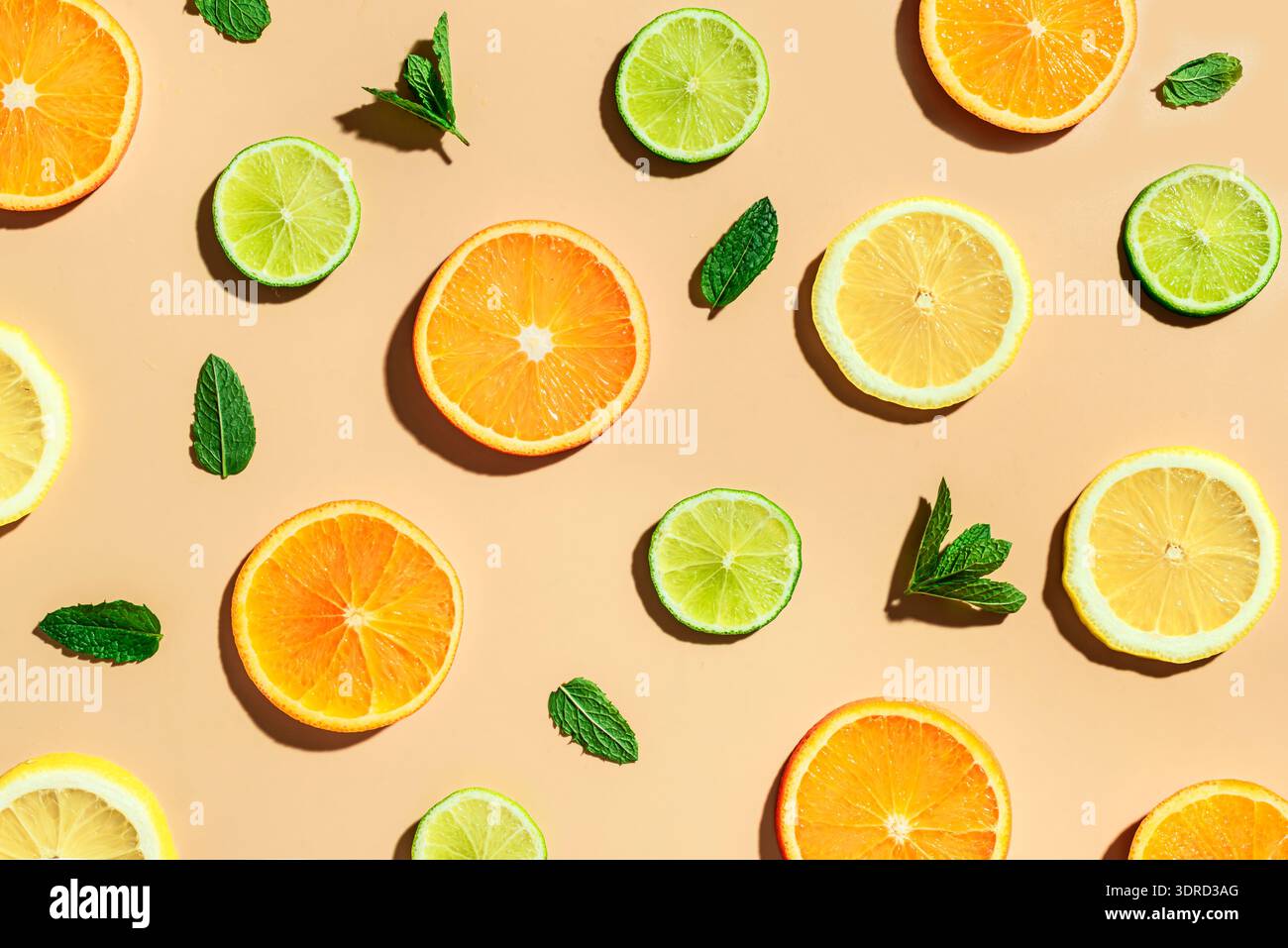 Citrus fruit slices pattern, orange, lemon, lime. Stock Photo
