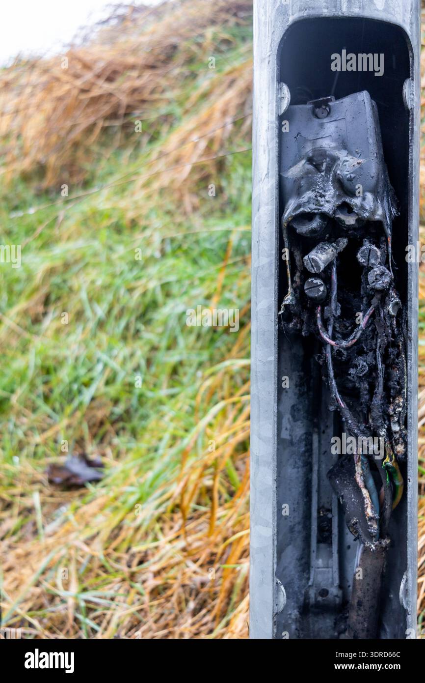 Short circuit in electrical system and its consequences Burnt cable junction box Stock Photo