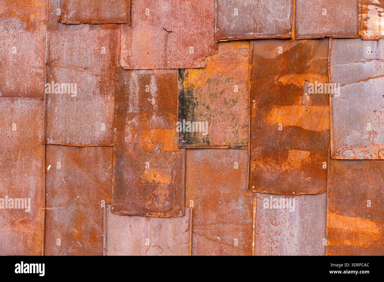 Texture background wall sheet metal plates rusty Stock Photo