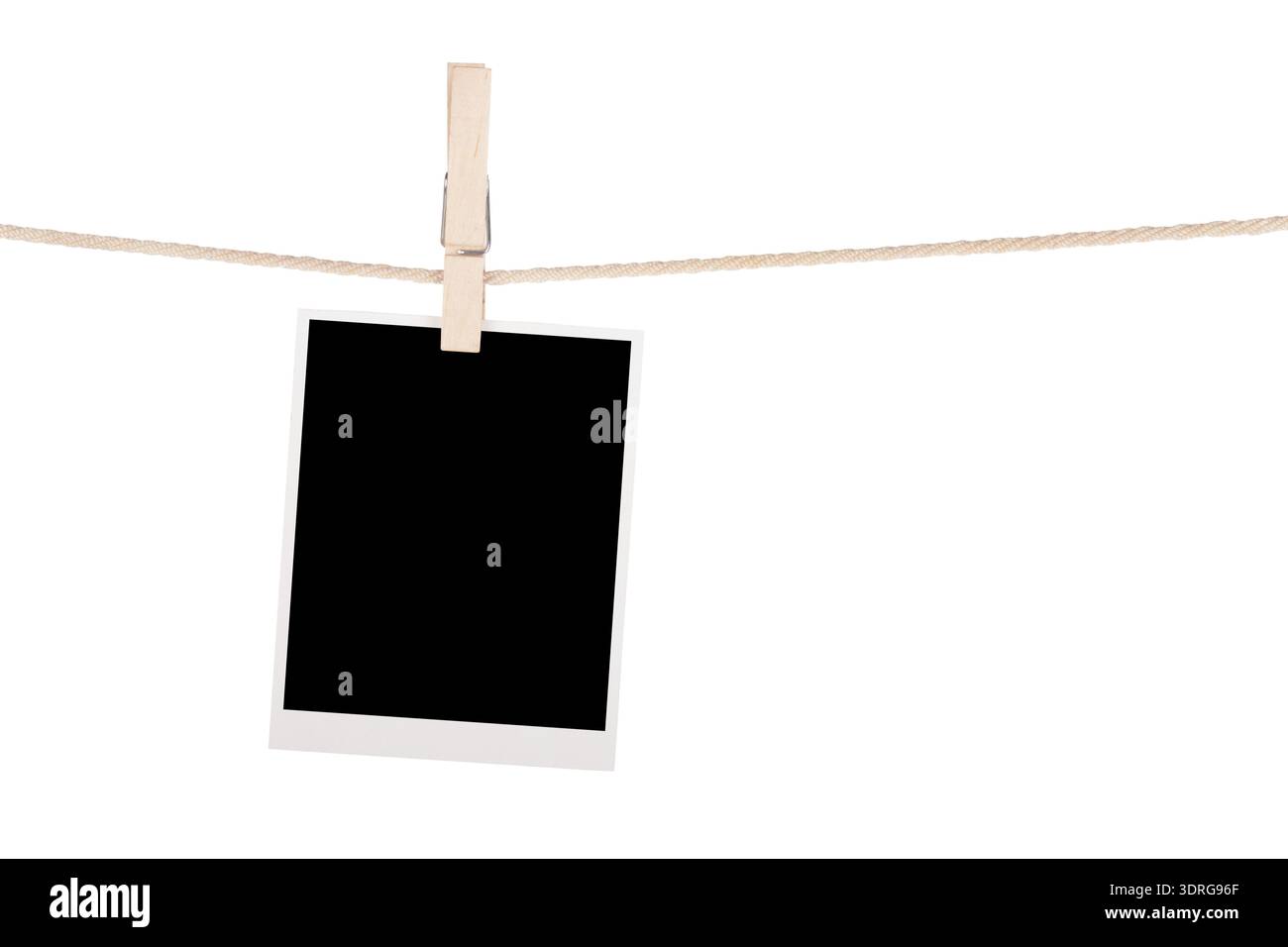 Blank photo hanging on clothesline Stock Photo