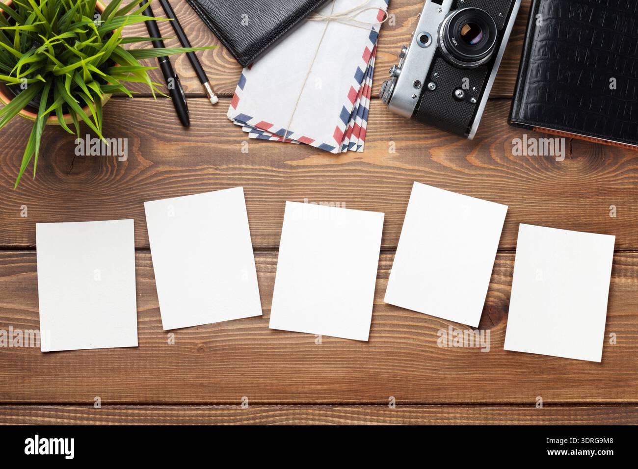 Blank photo frames, camera and supplies Stock Photo