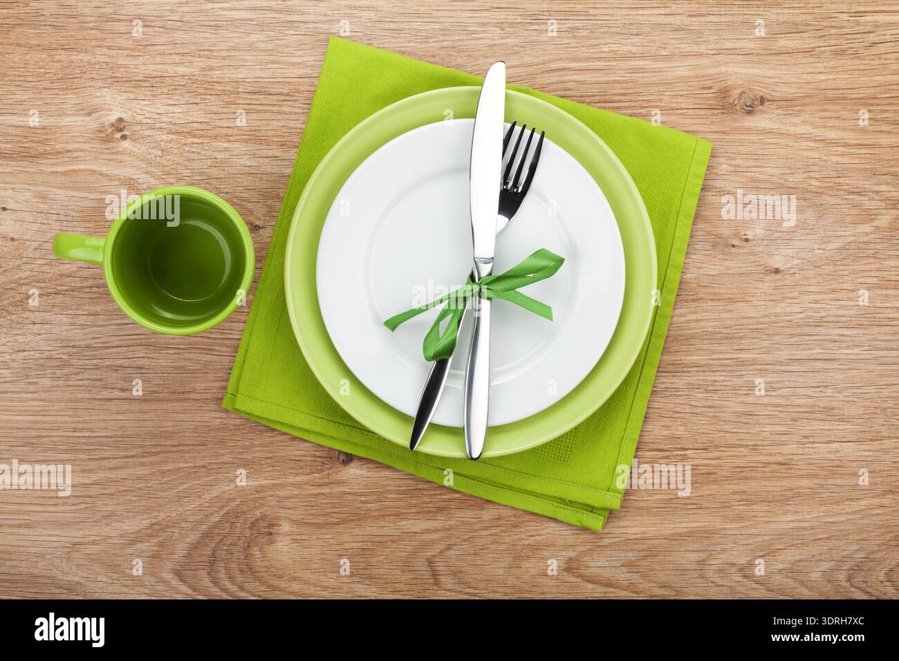Fork with knife, blank plates and napkin Stock Photo