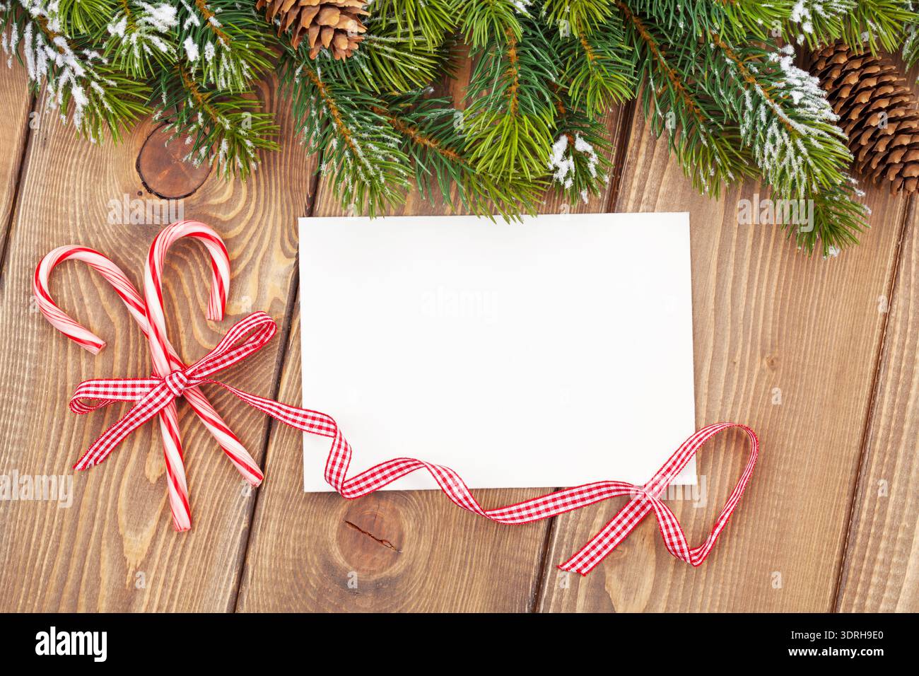 Christmas tree branch and blank greeting card Stock Photo