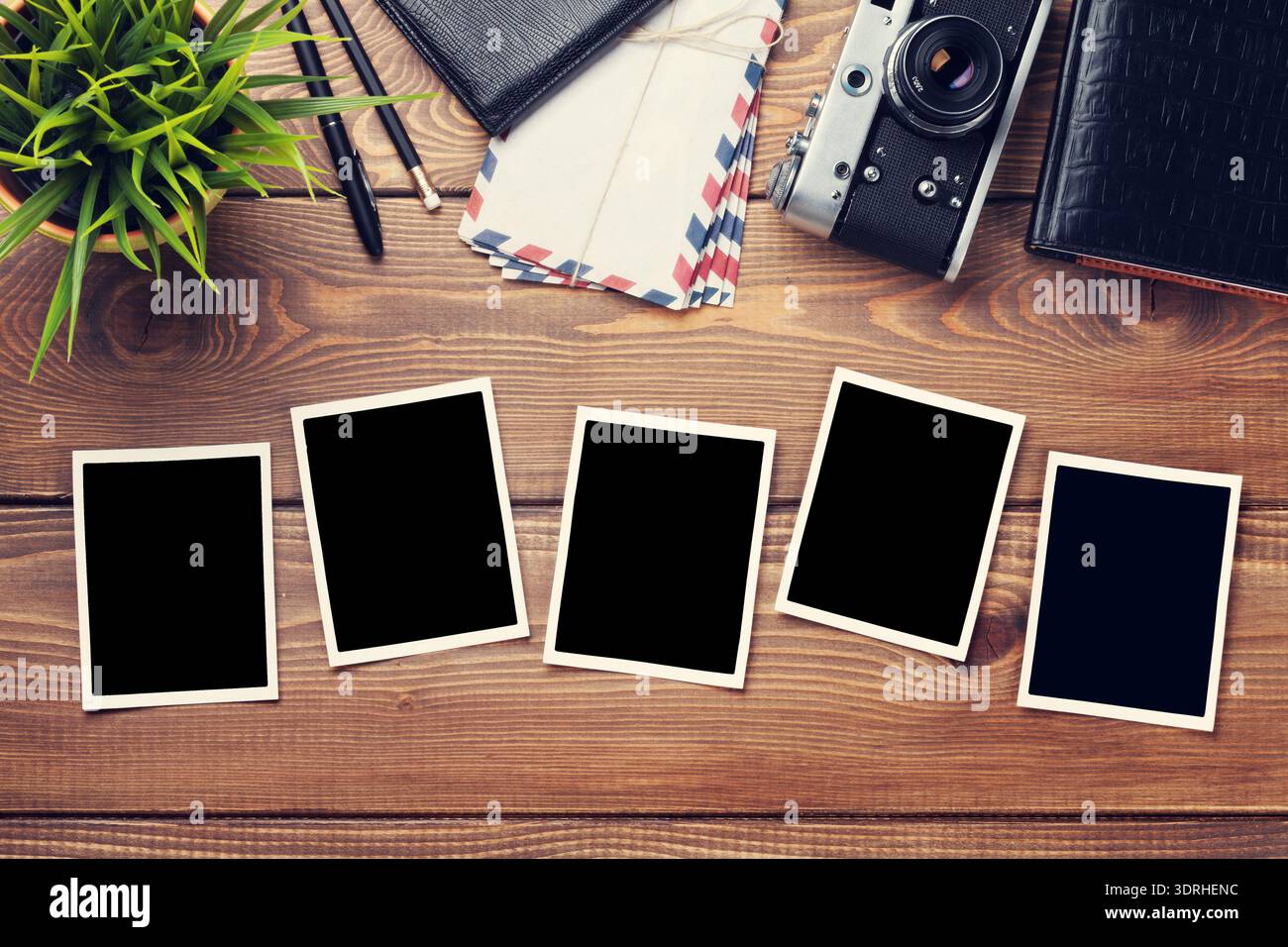 Blank photo frames, camera and supplies Stock Photo
