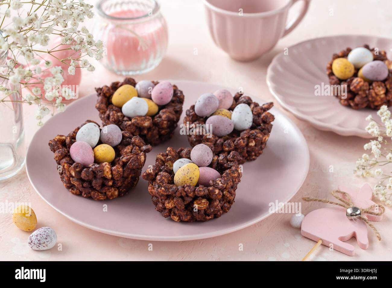Easter chocolate rice nest cake with mini candy eggs Stock Photo