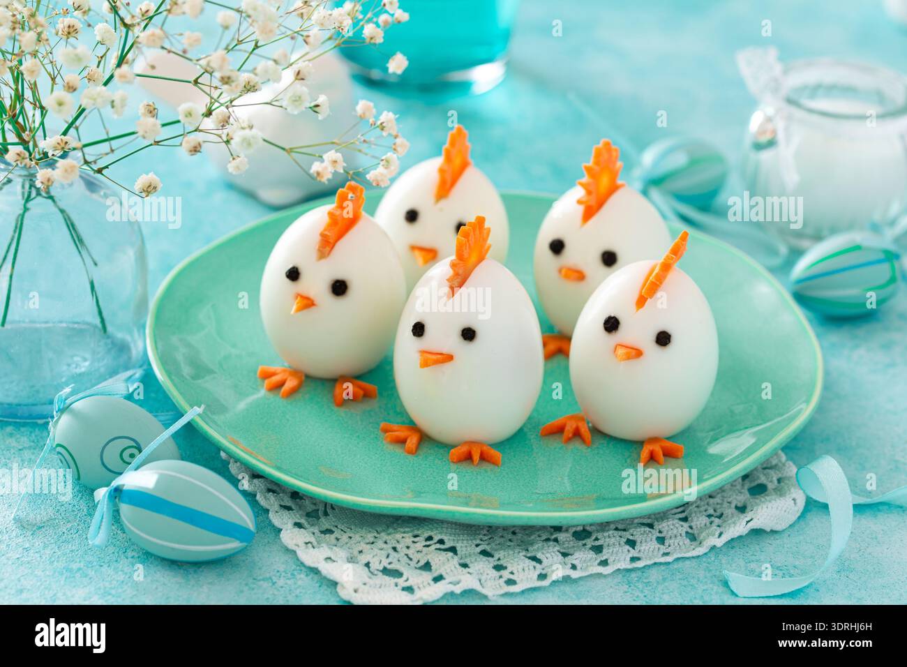 Funny eggs chicks. Easter idea for festive dinner Stock Photo