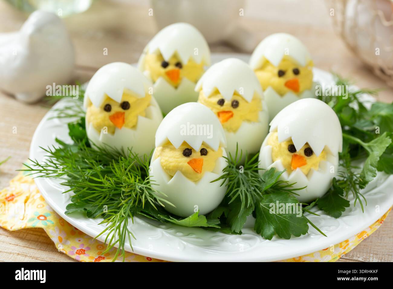Funny eggs chicks. Easter idea for breakfast Stock Photo