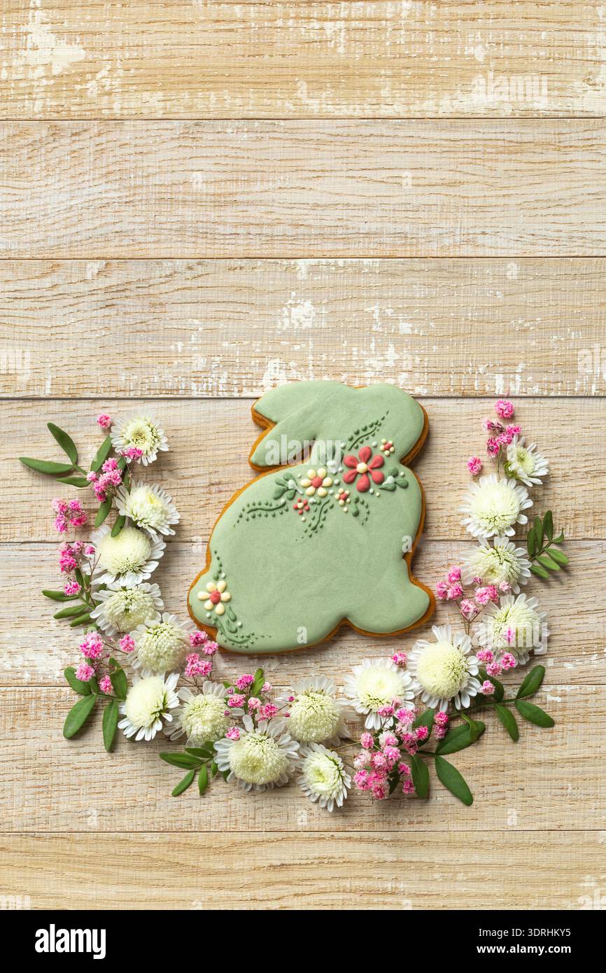 Wooden background with easter bunny cookies Stock Photo