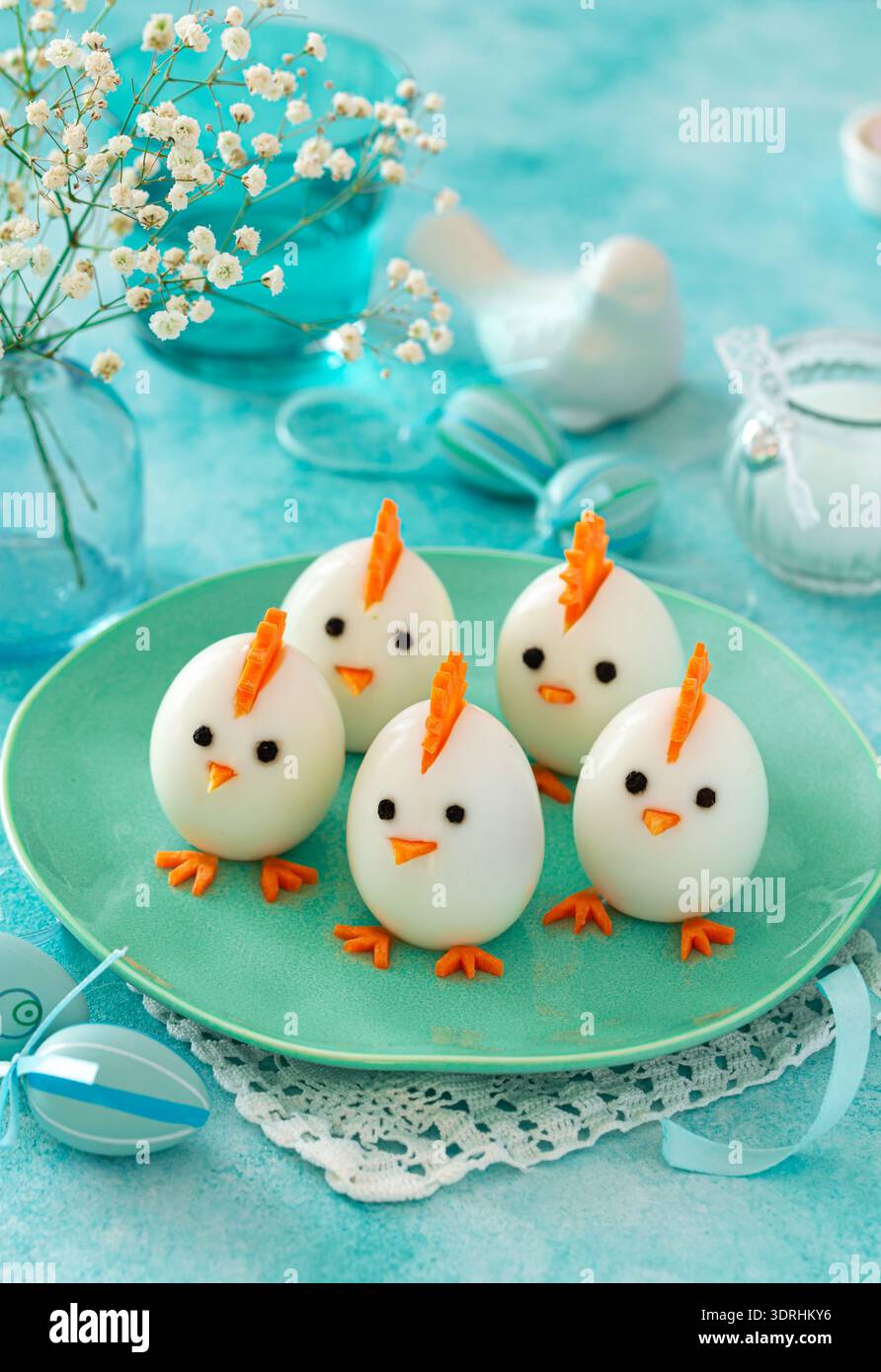 Funny eggs chicks. Easter idea for festive dinner Stock Photo