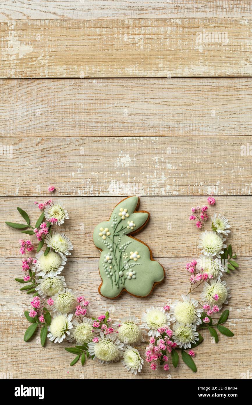 Wooden background with easter bunny cookies Stock Photo