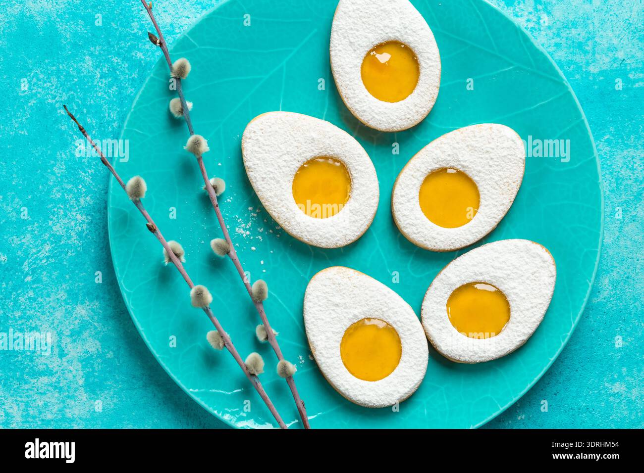 Easter linzer egg cookies with lemon jam filling Stock Photo