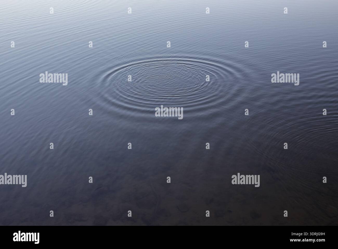 Concentric ripples spread across hi-res stock photography and images ...