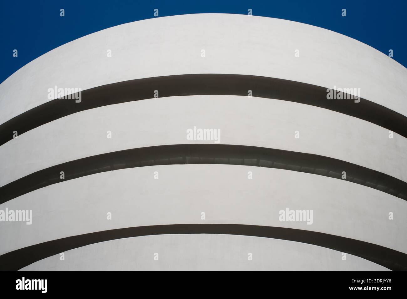 A close-up of the iconic white concrete curves and embossed lettering ...