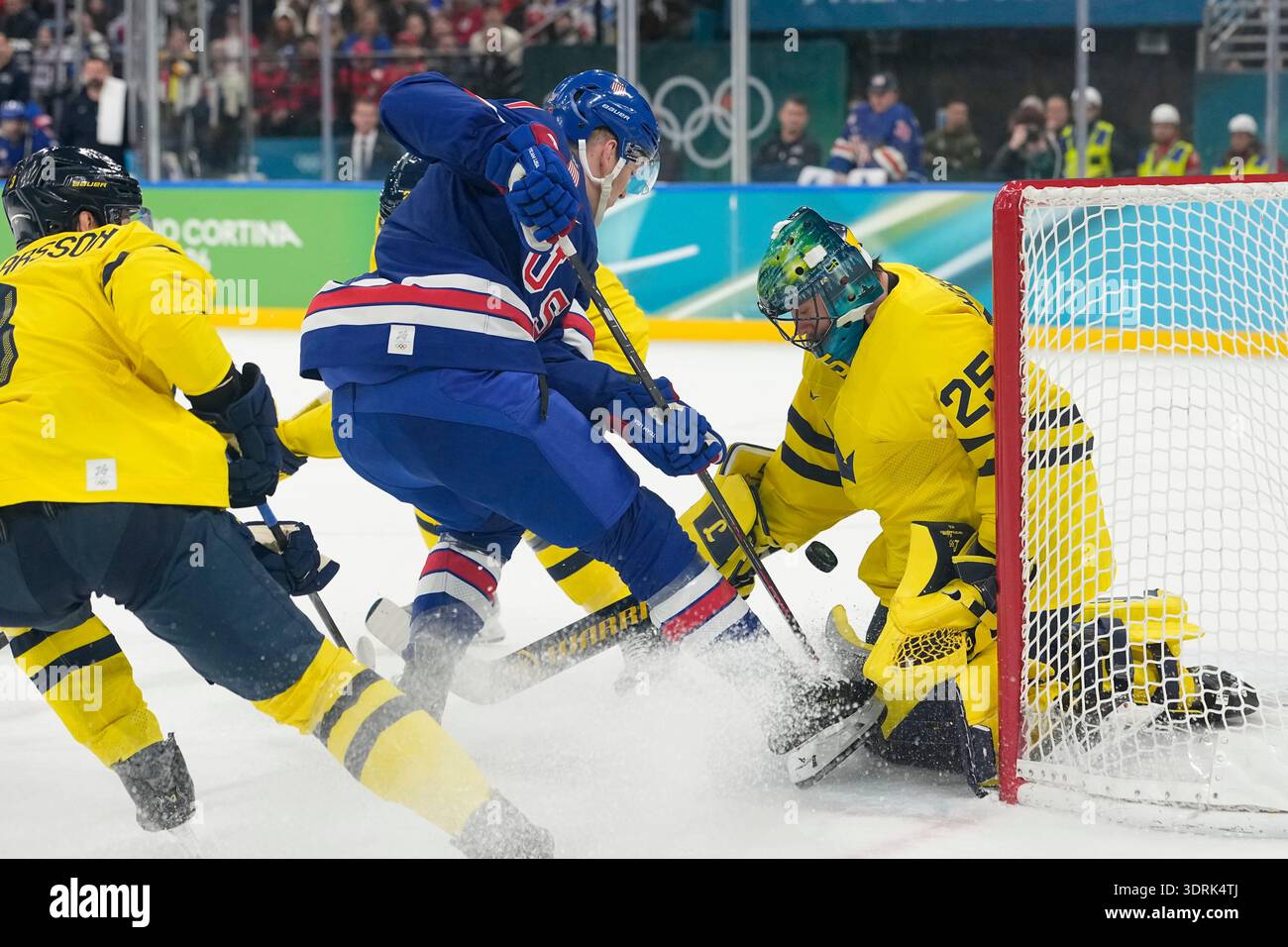United States' Brady Tkachuk crashes in on Sweden goalkeeper Jacob ...