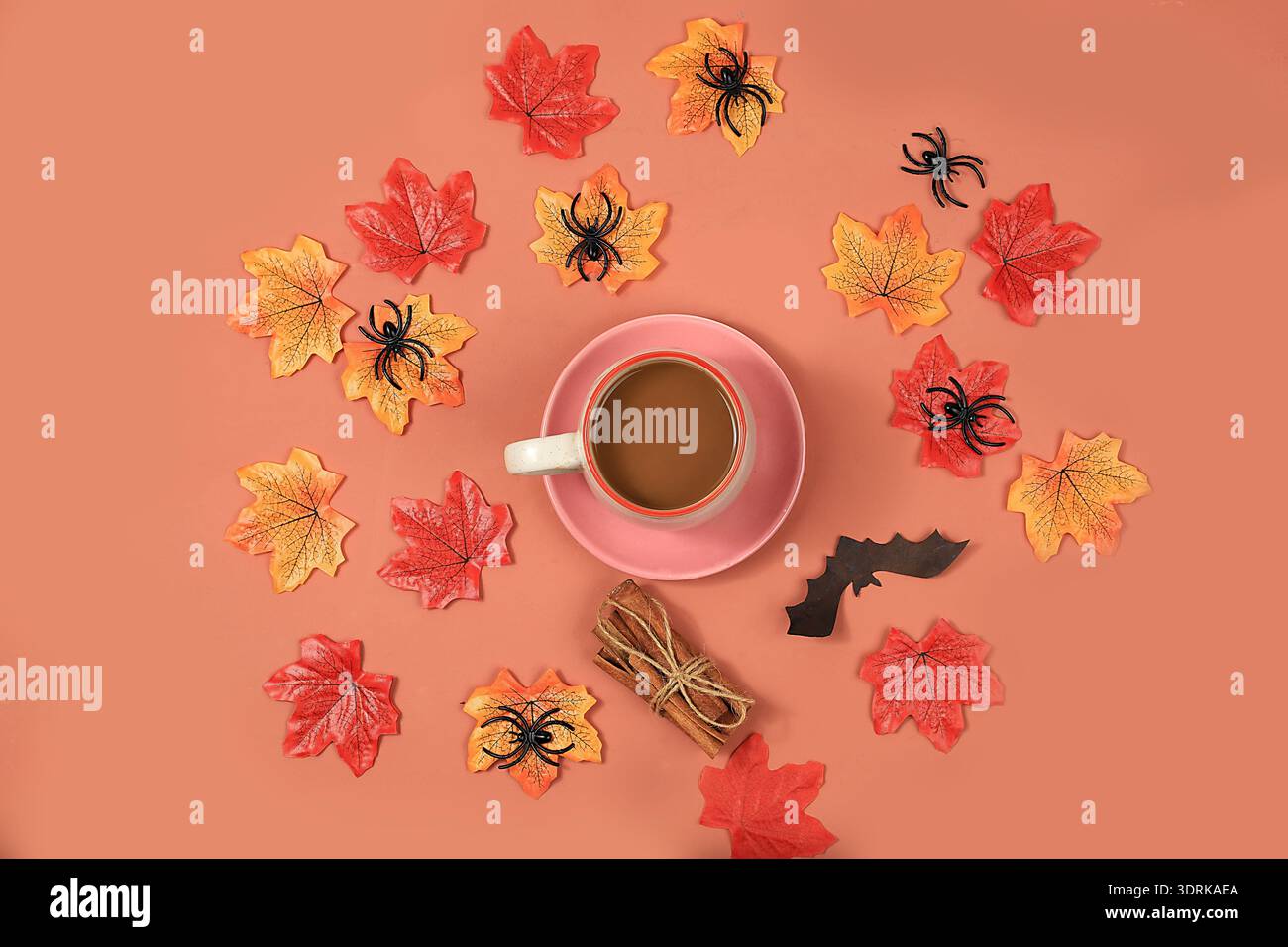 Autumn composition flat lay seasonal background with maple leaves, coffee, spiders and bats. Happy Thanksgiving, halloween greet Stock Photo